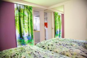 Säng eller sängar i ett rum på Kassel