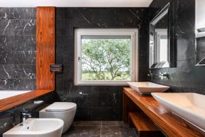 Koupelna v ubytování Casa tua Spa Resort