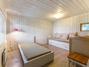 Postel nebo postele na pokoji v ubytování Holiday Home Ikonen by Interhome