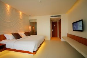 Postel nebo postele na pokoji v ubytování G Hua Hin Resort & Mall