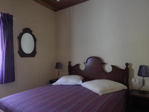 Кровать или кровати в номере Flag Hotel Foya Branca
