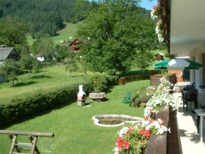 A garden outside appartementen Haus Bergblick