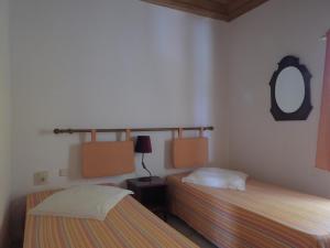 Кровать или кровати в номере Flag Hotel Foya Branca