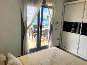 A bed or beds in a room at APARTAMENTO JMHR 5