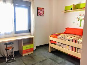A bed or beds in a room at APARTAMENTO JMHR 5