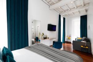 En eller flere senge i et værelse på Maison Giulia by Hili