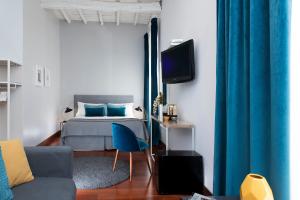 Et tv og/eller underholdning på Maison Giulia by Hili