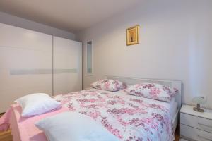 Postel nebo postele na pokoji v ubytování Fully renovated Apartment Grgo