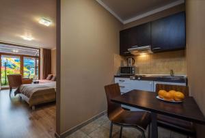 A bed or beds in a room at Apartmán Bešeňová