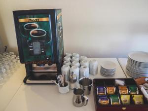 Facilități de preparat ceai și cafea la Ideal Hotel