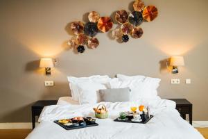 Rúm í herbergi á Hotel ML