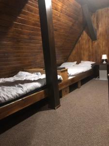 Llit o llits en una habitació de Lake House