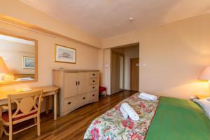 Postel nebo postele na pokoji v ubytování Hotel Fit Hévíz