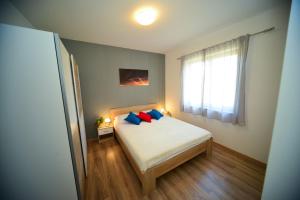 Ένα ή περισσότερα κρεβάτια σε δωμάτιο στο Apartment Marcella 2