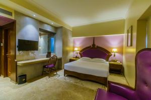 Postelja oz. postelje v sobi nastanitve Hotel Sai Palace , Mangalore