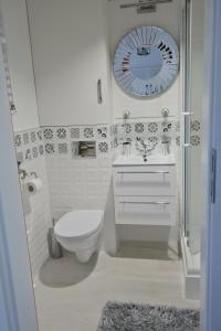 Kúpeľňa v ubytovaní Apartament Grochowa + 10 fotografií