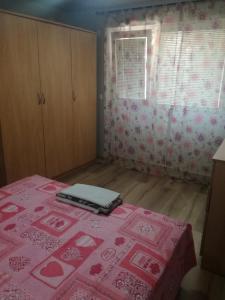 Кровать или кровати в номере Apartament Malomir