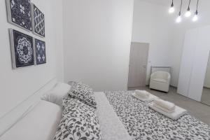 Postel nebo postele na pokoji v ubytování dRooms.