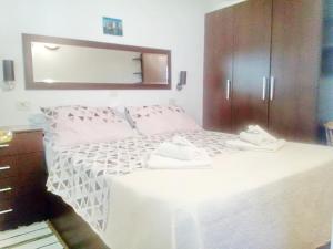 Postel nebo postele na pokoji v ubytování Apartment Rita + 15 fotografií
