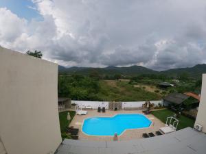 an overhead view of a swimming pool in a yard at Vamvini Hotel in Sarti