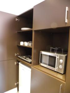 A kitchen or kitchenette at Apartaments i habitacions Can Morera Olot