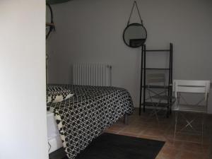 Giường trong phòng chung tại Domaine du Bel Air