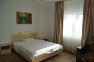 Posteľ alebo postele v izbe v ubytovaní Appartments near 7 km 5001155