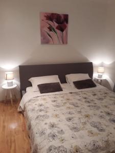 Postel nebo postele na pokoji v ubytování Apartment Lara