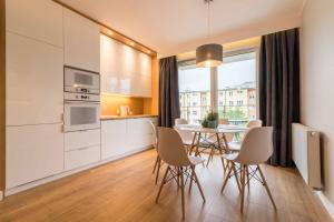 Kuchyňa alebo kuchynka v ubytovaní Apartament DREAM Angielska Grobla