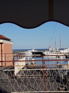 a view of a marina with boats in the water at APPARTAMENTO nonni FRANCHI in Loano