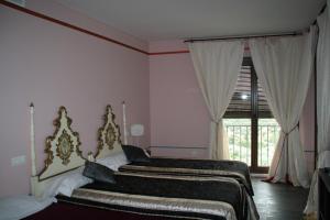 Cama o camas de una habitación en Caseria 7 Fuentes
