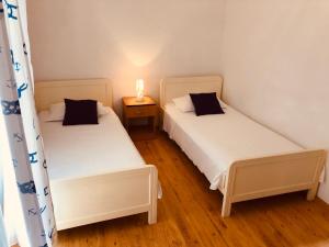 Posteľ alebo postele v izbe v ubytovaní Apartment Chupa