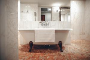 Koupelna v ubytování Leopolis Hotel