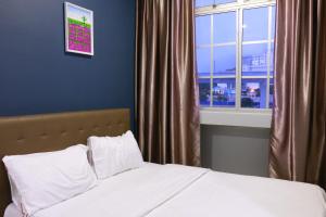 Postel nebo postele na pokoji v ubytování The b'Hotel + 37 fotografií