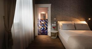 Posteľ alebo postele v izbe v ubytovaní La Fornace Relais & Spa