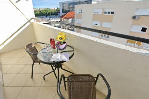 Un balcón o terraza de Apartment Ivica