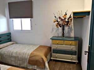 Ein Bett oder Betten in einem Zimmer der Unterkunft Casa Ananda y Casa Rengue