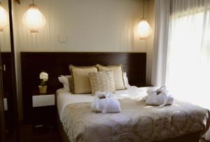Postel nebo postele na pokoji v ubytování Grey Manor Guesthouse