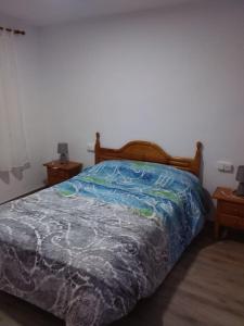 A bed or beds in a room at Apartamento Barcelo 4