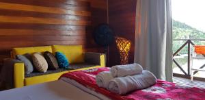 Un pat sau paturi într-o cameră la Moradas da Lu