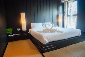 Postel nebo postele na pokoji v ubytování Trat 101 Hotel - SHA Certified