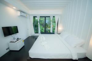 Postel nebo postele na pokoji v ubytování Trat 101 Hotel - SHA Certified