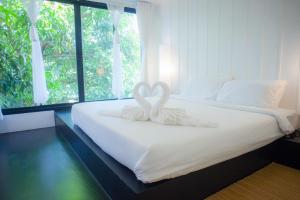 Postel nebo postele na pokoji v ubytování Trat 101 Hotel - SHA Certified