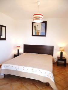 מיטה או מיטות בחדר ב-Lagrange Vacances - Green Bastide