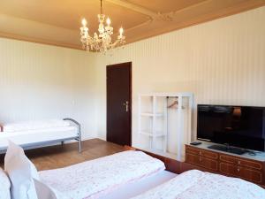 Łóżko lub łóżka w pokoju w obiekcie Aparthotel Pan Haus