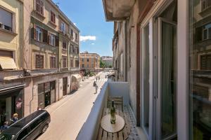 a view of a city street from a balcony at Preziosa in Pula