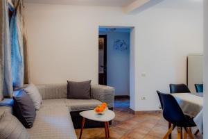 Uma área de estar em Apartment Katia