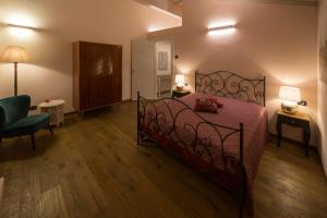 Łóżko lub łóżka w pokoju w obiekcie Agriturismo Casarai