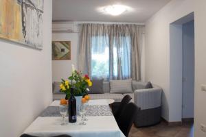 Uma área de estar em Apartment Katia