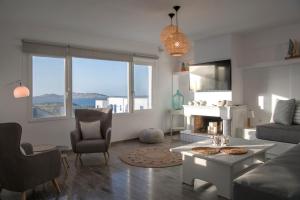 Posezení v ubytování Ammos Luxury Rooms & Home
